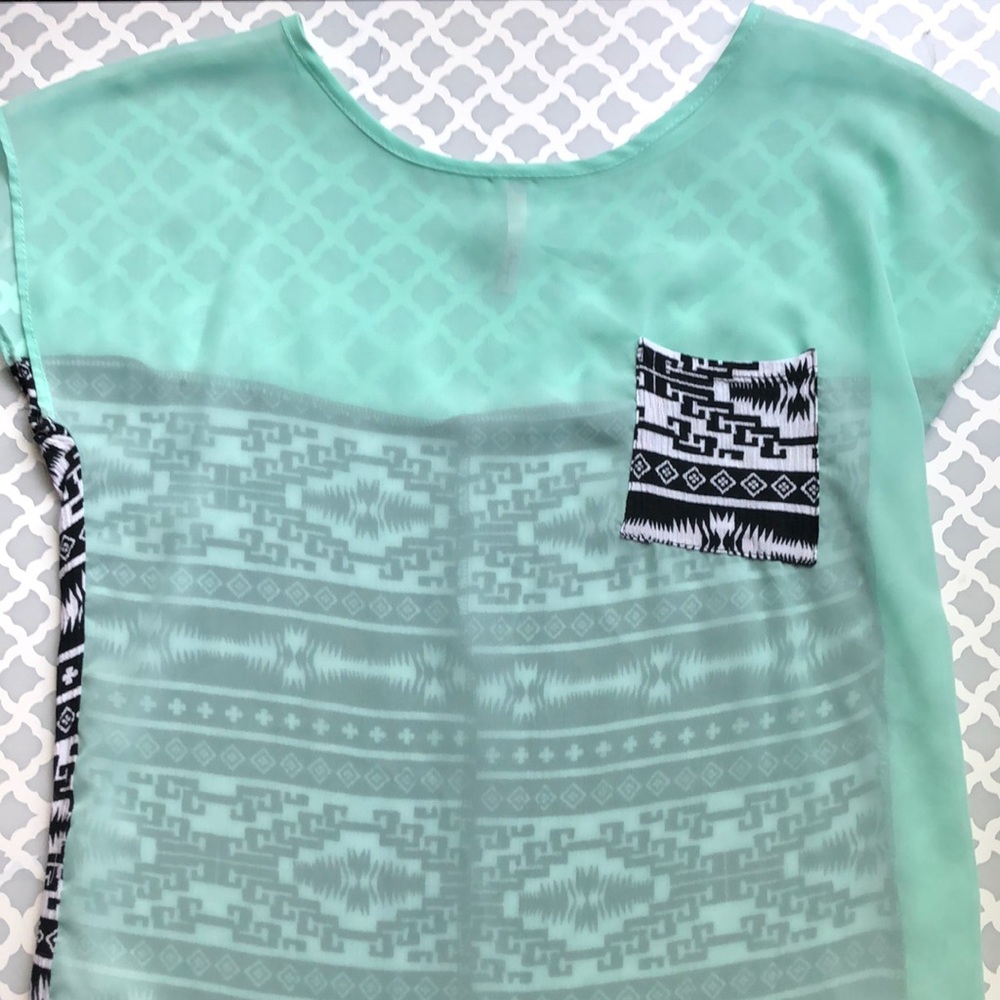 Sheer, teal and Aztec print top. Size medium.